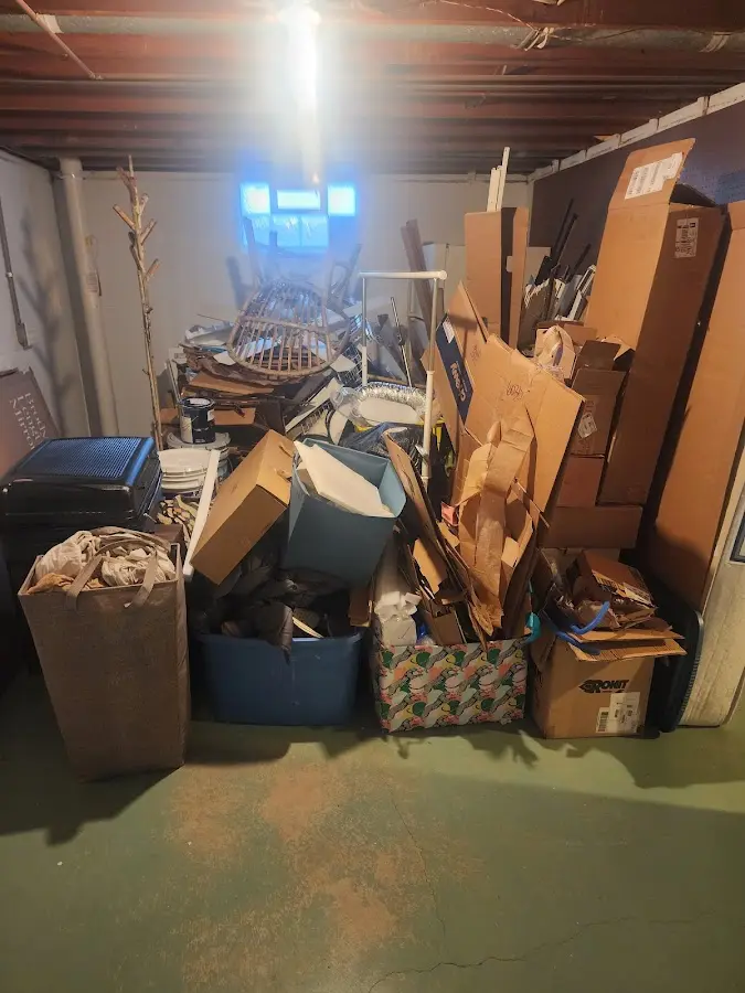 Roll-off dumpster container at job site for 8 Yard Dumpster Rental in Rockland